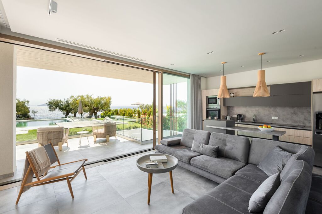 Luria Homes_villaC_livingroom_viewpool